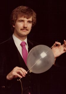 Magician Eddy Wade promotional photo with Needle thru Balloon effect