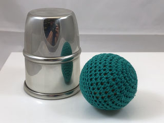 Hand Knit Ball. Green.with cup for size.jpeg